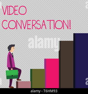Conceptual hand writing showing Video Conversation. Concept meaning Communicating visually with another demonstrating via computer Man Carrying a Brie Stock Photo