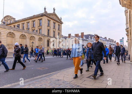 Oxford, UK. 1st May, 2019.  People walking away from May Day celebrations. Stock Photo