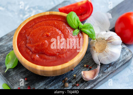 Bowl with homemade tomato sauce. Stock Photo