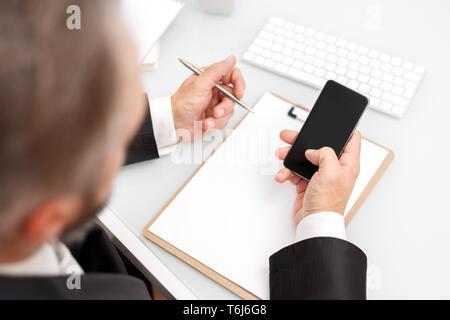 Male using smartphone Stock Photo