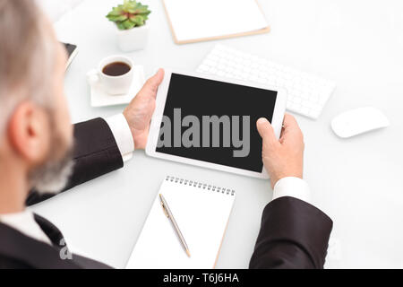 Male using tablet Stock Photo