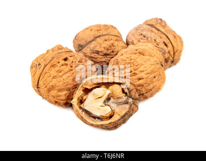 Several large walnuts with a half on a white background Stock Photo