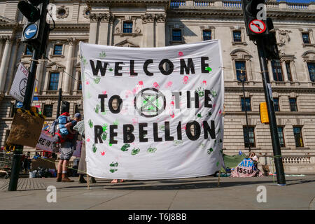 Supporters of Extinction Rebellion, a socio-political protest movement, hold days long protests focussing on climate change, in April 2019, at locatio Stock Photo