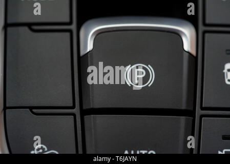 Electric parking brake in modern car close Stock Photo