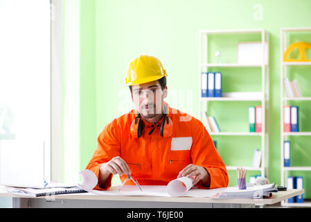 Construction supervisor planning new project in office Stock Photo