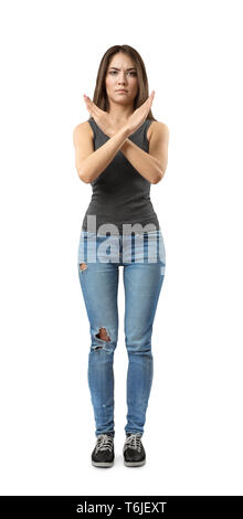 Young woman as full body shot from front with crossed arms Stock Photo -  Alamy