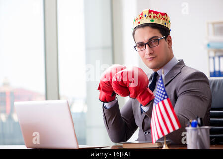 Businessman with American flag in office Stock Photo