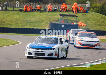 2014 Toyota Camry NASCAR demonstration with driver Tom Kristensen/Jochan Mass at the 77th Goodwood GRRC Members Meeting, Sussex, UK Stock Photo