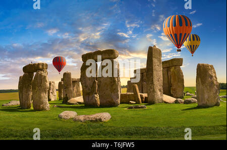 Hot air balloons over  Stonehenge Neolithic ancient standing stone circle monument, Wilshire, England Stock Photo