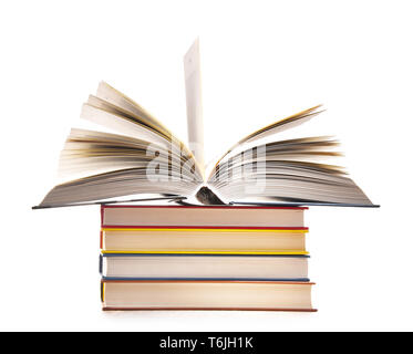 Composition with stack of books isolated on white. Stock Photo