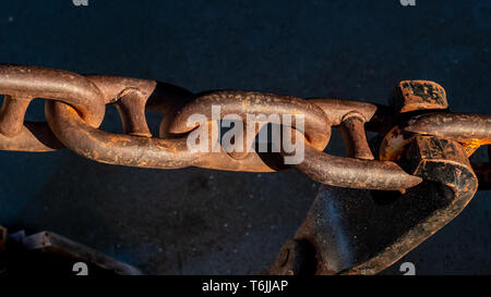 Links of a rusty anchor chain. Stock Photo
