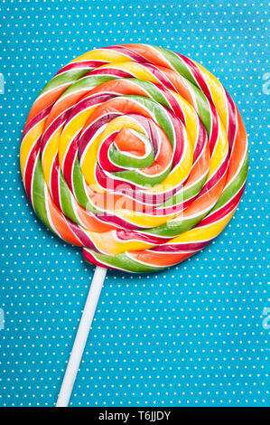 colorful lollipop on a blue background Stock Photo