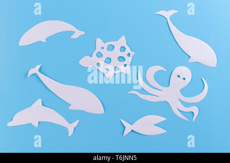 different animals in the ocean made of paper Stock Photo