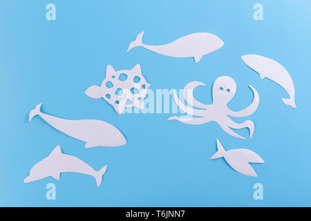 different animals in the ocean made of paper Stock Photo