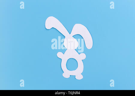 paper rabbit on the blue background image Stock Photo