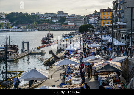 Porto, Portugal. April 29, 2019. Historic Porto bars and restaurants in famous Ribeira neighborhood attract tourists from all over the world Stock Photo