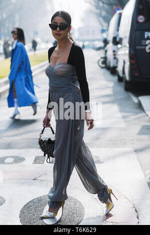 Milan, Italy - February 21, 2019: Street style – Woman wearing Fendi before  a fashion show during Milan Fashion Week - MFWFW19 Stock Photo - Alamy