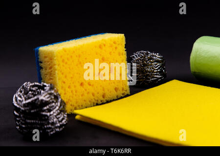 https://l450v.alamy.com/450v/t6k6rr/dishwashing-concept-on-a-black-background-different-washcloths-and-scrubbers-for-washing-dishes-t6k6rr.jpg