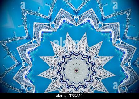 Abstract image created using a kaleidoscope filter of the harbour in Barcelona, Spain, October 2018. Stock Photo