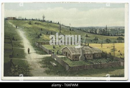 Color postcard depicting a circa 1621 view of a grassy hill, with Governor William Bradford's thatched roof, single-story log cabin, with smoke escaping from the stone chimney stack, and a wooden fence surrounding the perimeter; additional wooden fences, and two figures standing on a chalk-colored dirt path leading to wooden structure are visible at left and in the background; located in Plymouth, Massachusetts; with a copyright by publisher AS Burbank, 1914. From the New York Public Library. () Stock Photo