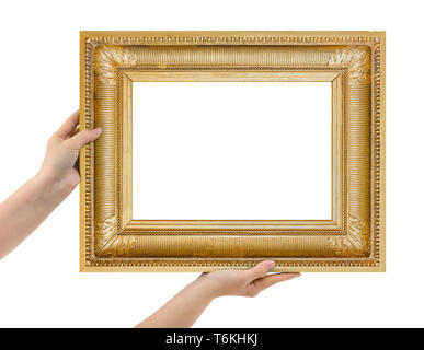 Wooden picture frame in hands Stock Photo
