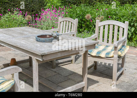 Garden furniture wooden table and chairs Stock Photo - Alamy