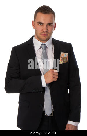 Businessman with money in his pocket; isolated on whit Stock Photo