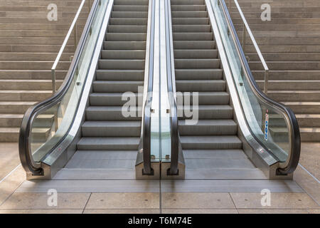 Stone stairs with elevator in modern building Stock Photo