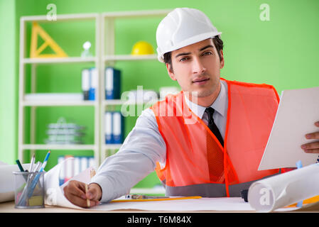 Man architect working on the project Stock Photo
