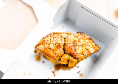 Box from store storebought bundt cake carrot or pumpkin halloween autumn christmas season macro dessert showing detail and texture Stock Photo