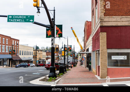 Wytheville, USA - April 19, 2018: Small town village street signs for Church and Tazewell intersection in southern south Virginia, historic brick buil Stock Photo