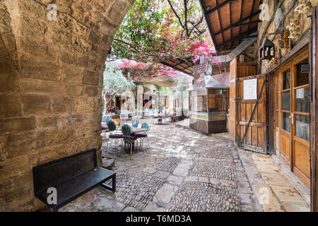 Outdoor terrace of a restaurant in Byblos old souk, Jbeil, Lebanon Stock Photo