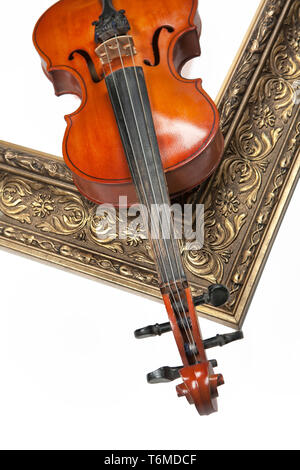 Violin And Golden Frame Stock Photo