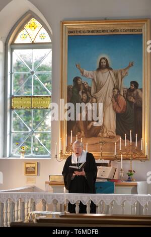 Sermon at the Church on Ruhnu Island Stock Photo