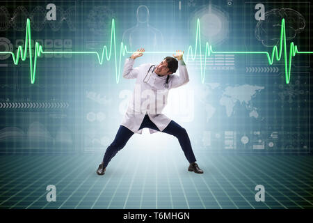 Doctor cardiologist supporting cardiogram heart line Stock Photo