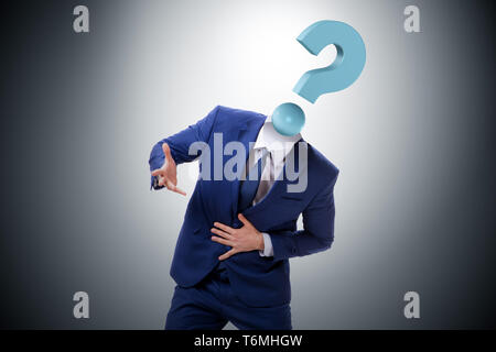 Businessman with question mark instead of head Stock Photo