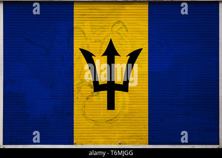 Close-up of old metal wall with national flag of Barbados. Concept of Barbados export-import, storage of goods and national delivery of goods. Flag in Stock Photo