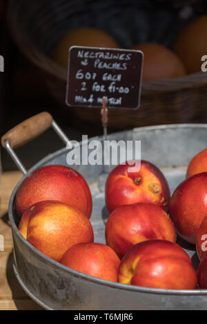 Nectarines and peaches for sale Stock Photo