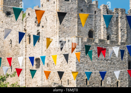 Colorful flags fluttering in the wind Stock Photo