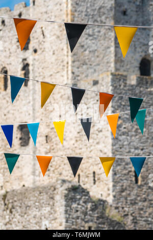 Colorful flags fluttering in the wind Stock Photo