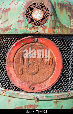 Front view of an old tractor with maximum speed sign Stock Photo