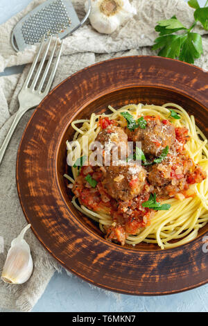 Pasta with meatballs in tomato sauce. Stock Photo