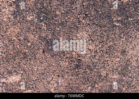 Texture of wall black and brown made from stone and cement at clean and simple for background Stock Photo