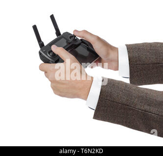 Radio remote control in hands Stock Photo