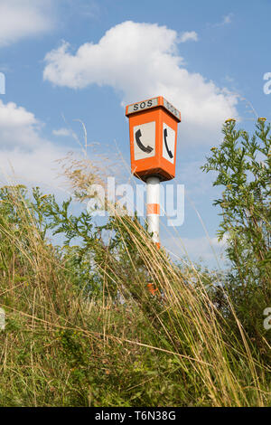Emergency call post in a rural landscape Stock Photo