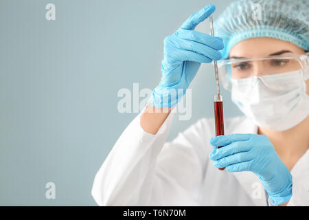 Taking Samples With Glass Pipette From A Falacon Tube. Laboratory 