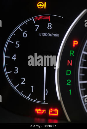 Colorful warning sign in car dashboard close up view Stock Photo