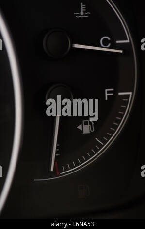 Empty gas car tank close up view on dashboard Stock Photo