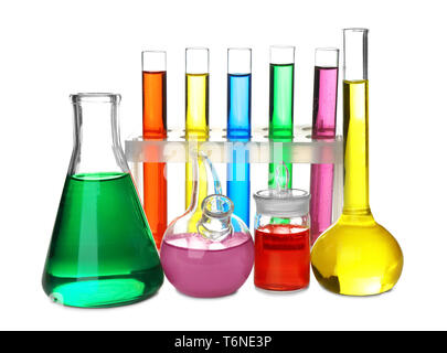 Chemical glassware with colorful samples on white background Stock Photo