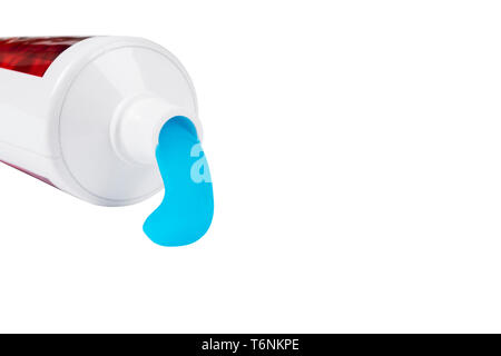 Toothpaste isolated on white background. Tube of blue toothpaste isolated on white with clipping path. Close up. Toothpaste squeezed out from a tube. Stock Photo